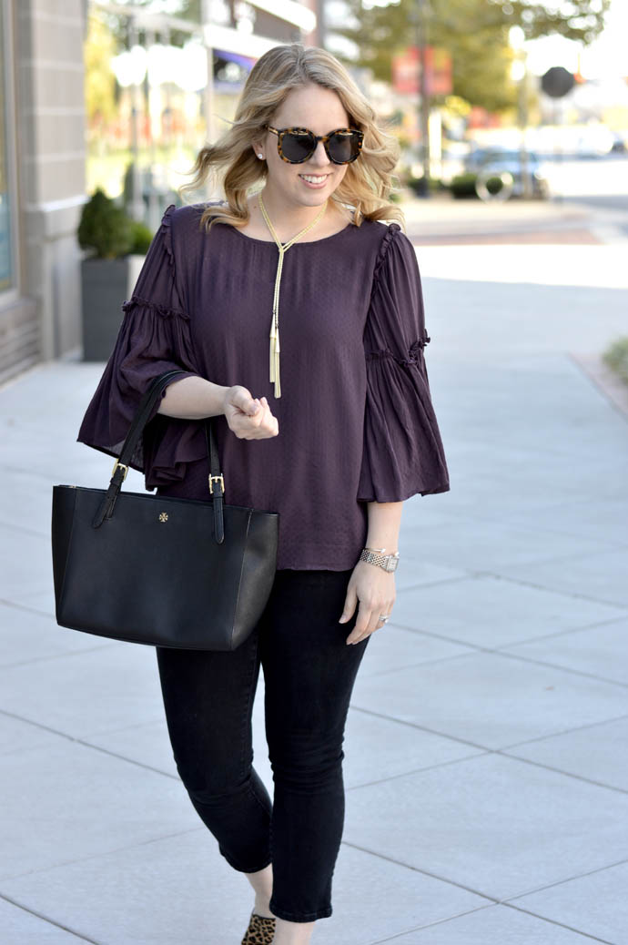 black cropped jeans purple top outfit