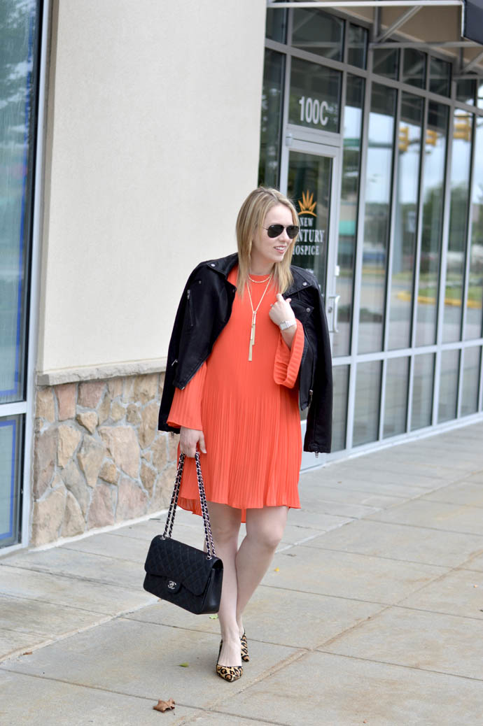 orange swing dress faux leather jacket