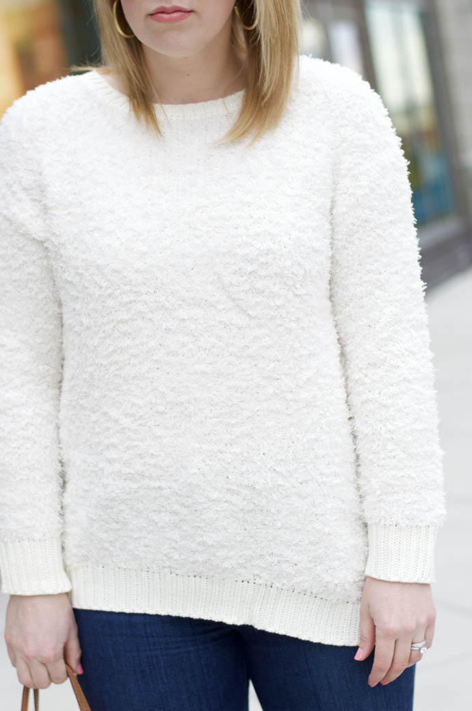 white fuzzy sweater
