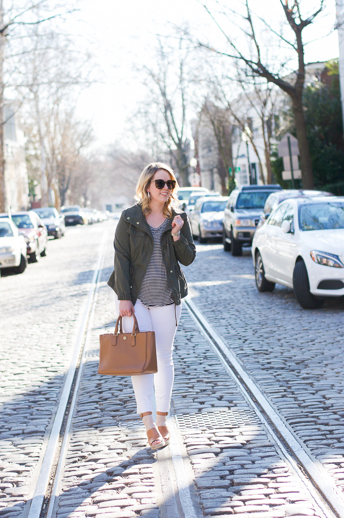 utility jacket white jeans and beige accessories